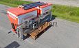 Portaaltractor met werktuigen