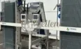 Kistenvuller met opvoerbanden