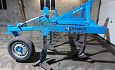 Front vleugelschaarcultivator