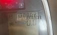 Tractor met strodekmachine combinatie