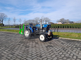Tractor met compressor