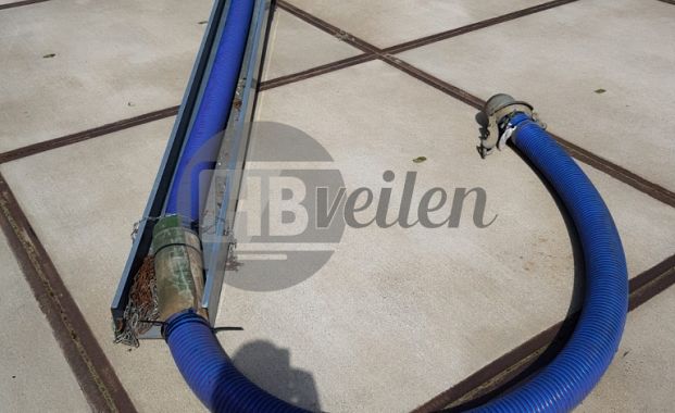 Drijver met aanzuigslang
