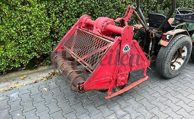 Spitmachine