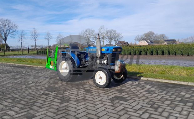 Tractor met compressor
