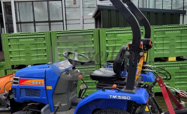  Tractor TM 3160 met sneeuwschuif en weidebloter 