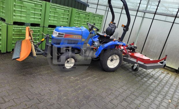  Tractor TM 3160 met sneeuwschuif en weidebloter 