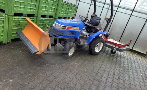  Tractor TM 3160 met sneeuwschuif en weidebloter 