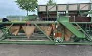 Bunkersorteermachine met voorsorteerder en toevoerband