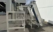 Kistenvuller met opvoerbanden