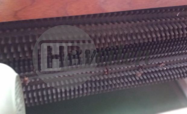 Ontklistermachine met rollenreiniger