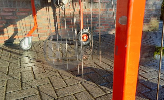 Wiedeg met hefinrichting